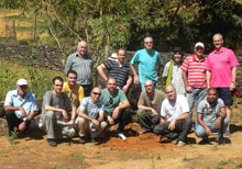 Group picture of the participants with seedling
